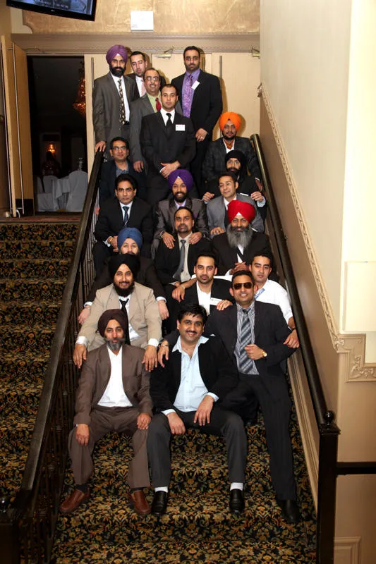 SPEATBC leadership and community members gathered on a staircase