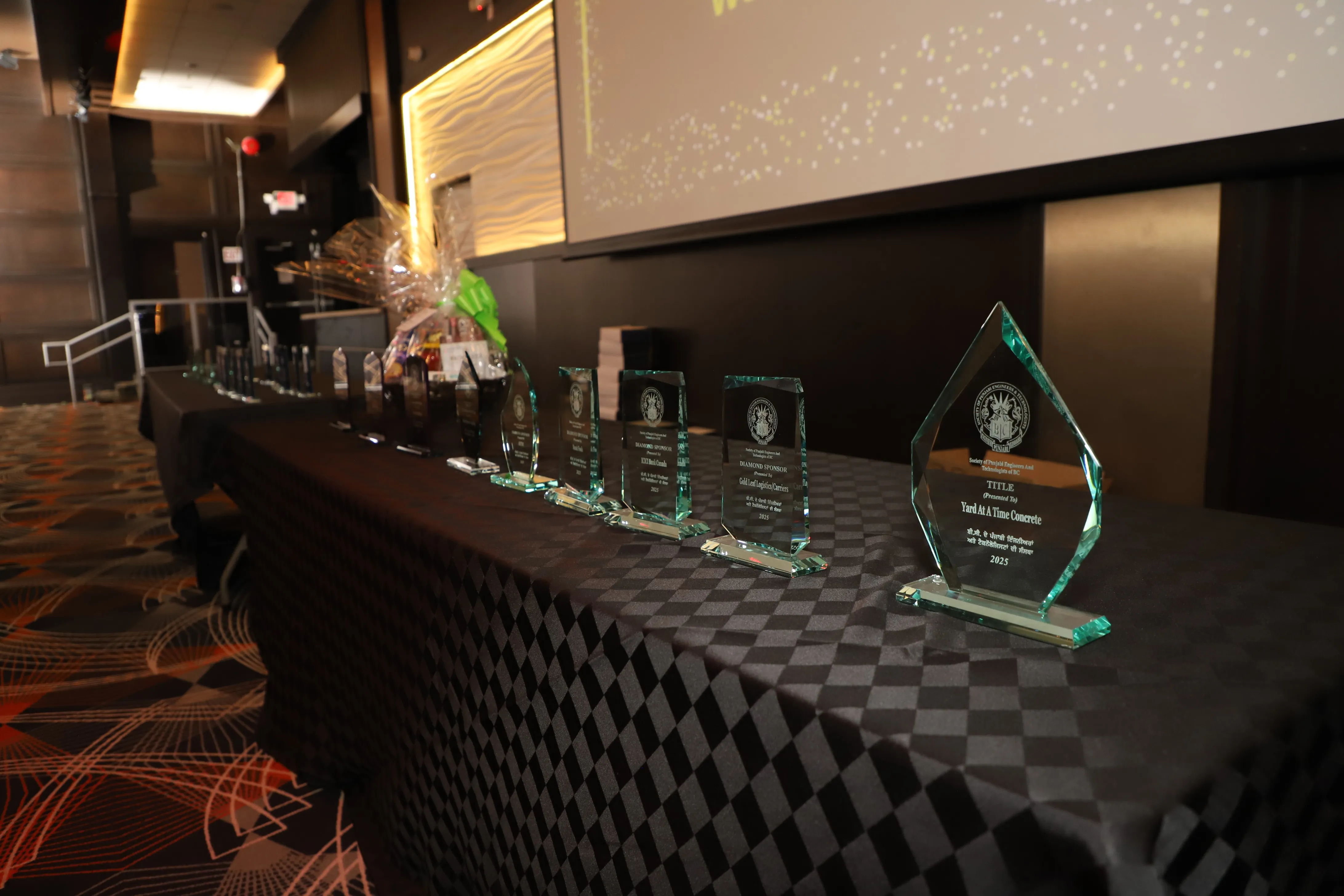 SPEATBC recognition awards displayed at a community event